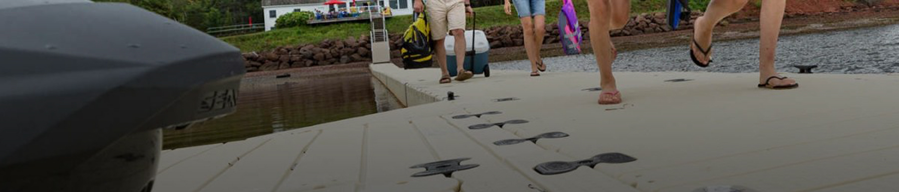 Group of people walking on dock wearing sandals