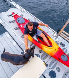 Man and dog on EZ Launch® Residential