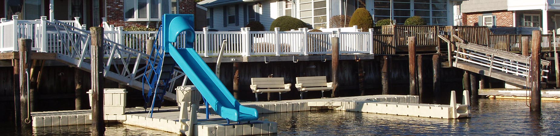 Residential dock with sliding board