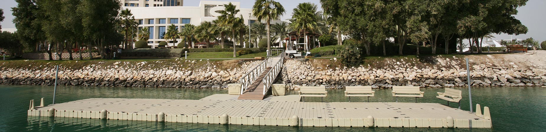 Floating dock attached to rocky beach