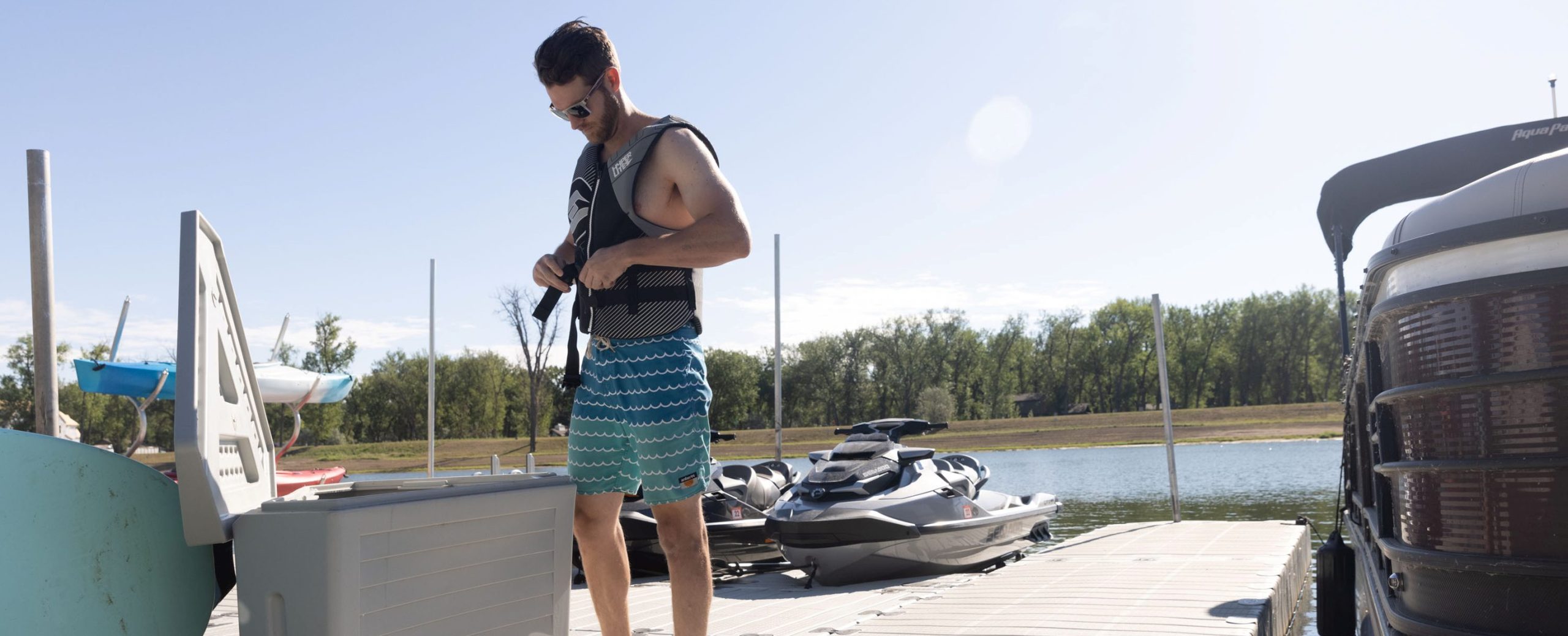 Man putting on life vest