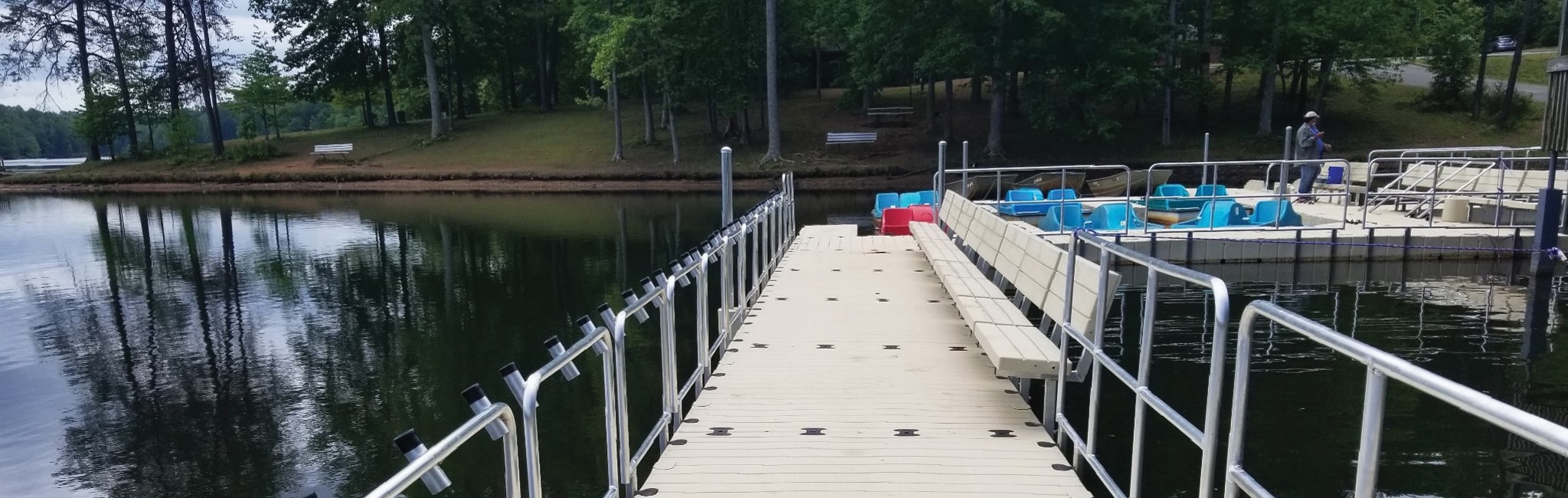 A dock with added railings and benches